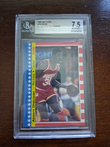 1987-88 Fleer Stickers Hakeem Olajuwon #3 BGS 7.5 HOF - Picture 1 of 2
