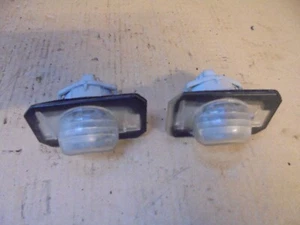 HONDA CIVIC 2004 5 PUERTAS ESCOTILLA PAR DE LUCES TRASERAS MATRÍCULA - Imagen 1 de 2