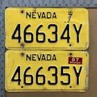 1987 Nevada plaque d'immatriculation taxe kilométrage lot de deux consécutifs CAMIONNAGE 15385
