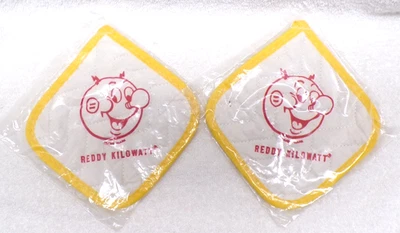 VTG 2 Reddy Kilowatt Pot Holder Hot Pad Magnetic Electric Co. Mascot Logo Sealed - Image 1 of 4