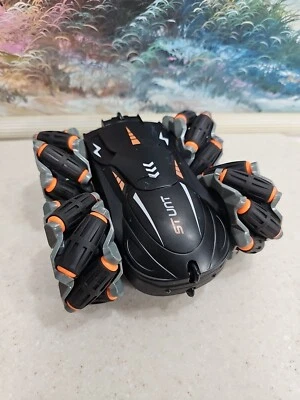 Remote Control Stunt Car Drift Double-sided Bounce 2.4G 4WD Rock Crawler *Parts* - Image 1 of 4