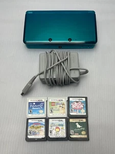 NINTENDO 3DS AQUA BLUE includes charger & lot of two 3DS games + four DS games - Picture 1 of 9