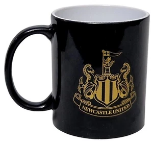 Taza de café NEWCASTLE UNITED oficial doble escudo dorado negro taza de Castore - Imagen 1 de 2