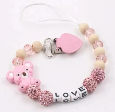 Schnullerkette Aus Silikon. Perfekt Für Zahnende Babys In Rosa  - Bild 1 von 4