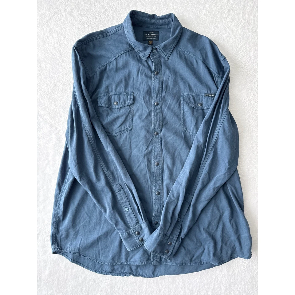 Camisa Lucky Brand lavada y usada para hombre talla XXL denim azul manga larga a presión  Foto 1 de 4