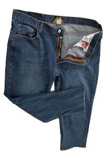 Pantalones de mezclilla elásticos de corte clásico azul Lucky Brand By Gene Montesano 36 para hombre - Imagen 1 de 16