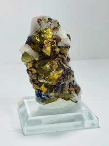 Calcite/Chalcopyrite/Fluorescent/Quartz/Sphalerite/Peacock Ore/Glass Base - Picture 1 of 11