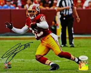 Santana Moss Autographed Redskins 8x10 PF Photo Running w/ Ball- JSA W Auth *Blk - Picture 1 of 2