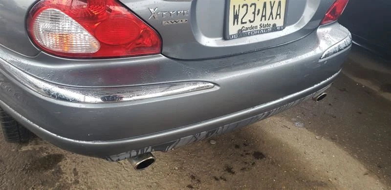 Clip de freno de parachoques trasero completo OEM 2002 2003 2004 2005 Jaguar X Type Foto 1 de 4