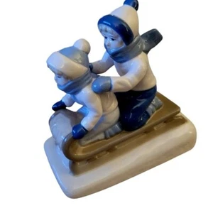 Paul Sabastian Porcelain Figurine of Children Boys Sledding Pastel Colors - Picture 1 of 5