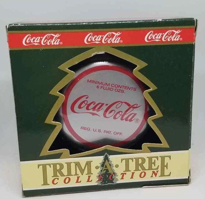 Coca-Cola 1990 Plastic Bottle Cap Santa Holding a Bottle Coke Ornament Cicra1952