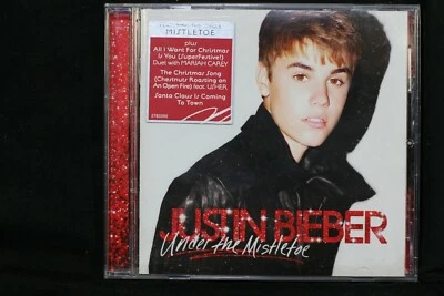  Justin Bieber ‎– Under The Mistletoe – CD (C857) Foto 1 de 3