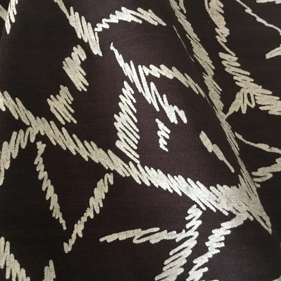 Precioso tejido jersey elástico marrón/crema, 0,90 metros Foto 1 de 4