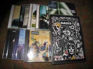 OASIS BEADY EYE NOEL GALLAGHER JOB LOT OF SEVEN USED UK CD ALBUMS & TWO DVD'S.
