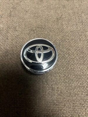 Tapacubos central de rueda negra Toyota Prius 2016-18 OE 42603 52170 A550 Foto 1 de 2