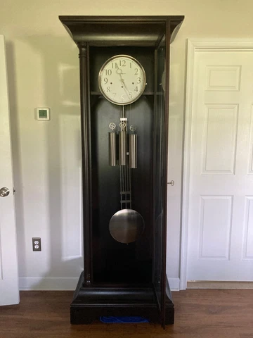 Howard Miller Tall Case Clock Seville Model No. 611-032 Runs 3 Chimes Cover