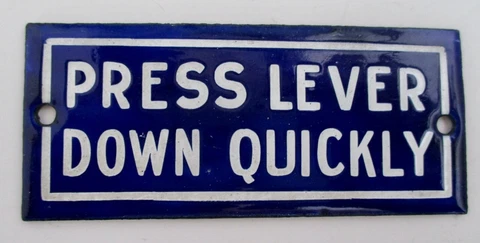 Vintage Blue and White Enamelware Metal PRESS LEVER DOWN QUICKLY Plate Plaque Cover