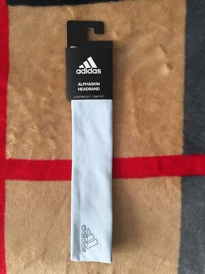 Diadema Adidas Alphaskin para mujer azul claro OSFM Foto 1 de 3