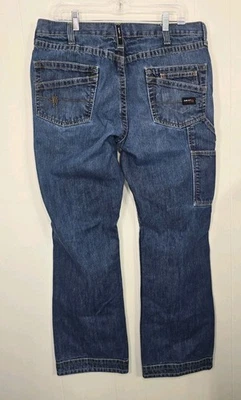 Pantalones de mezclilla Ariat FR M4 para hombre corte bota relax 36x34 CAT2 2112 azules resistentes al fuego manchas Foto 1 de 4