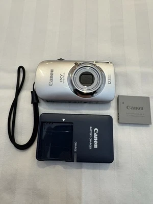 Canon IXY Digital 510 IS Silver 12.1 MP Digital Camera powershot Elph - Image 1 of 4