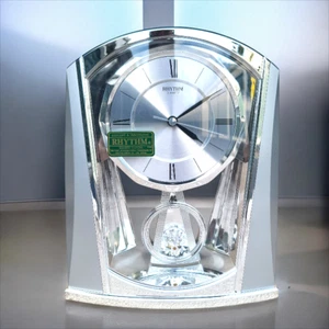 Rhythm Clocks Silver Swing Wall Clock - Model #4RP772WT19 - Elegant Motion & Mel - Picture 1 of 11