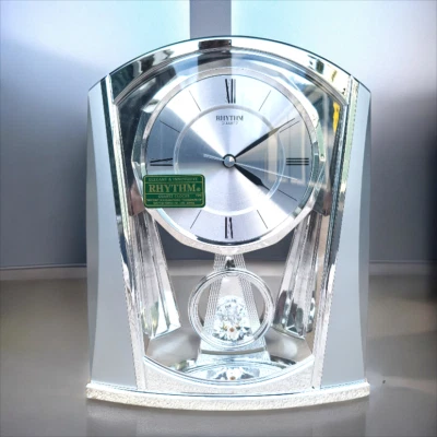 Rhythm Clocks Silver Swing Wall Clock - Model #4RP772WT19 - Elegant Motion & Mel - Image 1 of 4