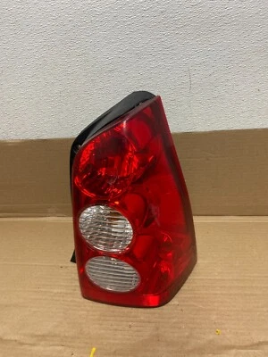 Luz trasera lateral izquierda pasajero derecho Mazda Tribute 2005 2006 OEM O2438 DW Foto 1 de 4