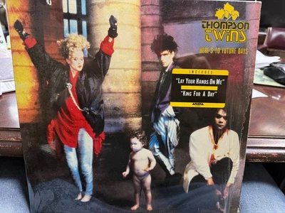 THE THOMPSON TWINS  HERES TO FUTURE DAYS LP 1985 SHRINK HYPE AD Foto 1 de 2
