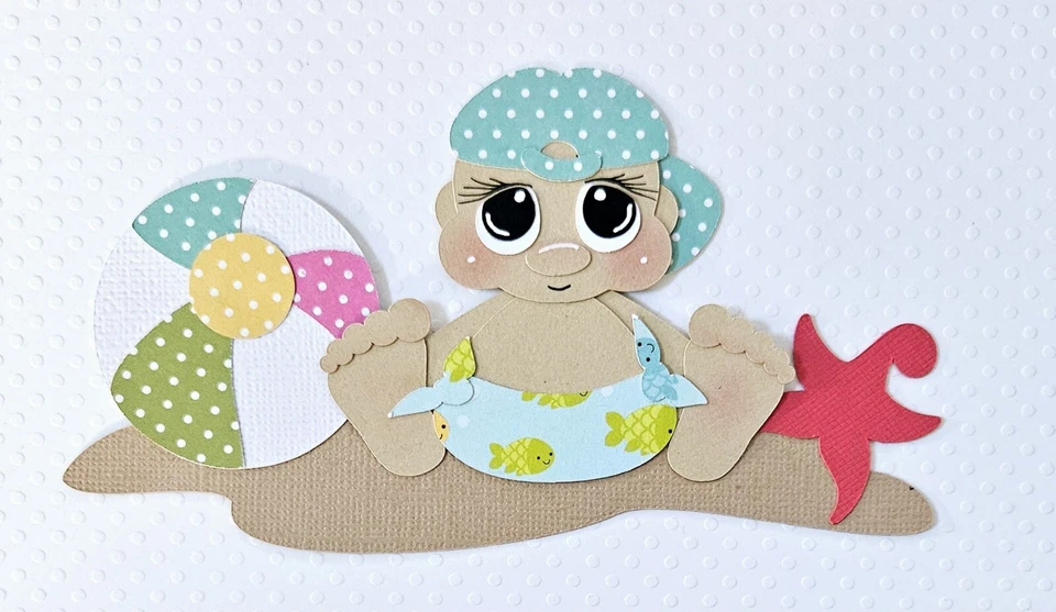 Bebé niño playa. Álbum de recortes, piezas de papel para hacer tarjetas Foto 1 de 1
