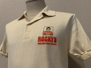 Vintage 80's Rocky's Philadelphia Steaks Beige Polo T Shirt Size M - Picture 1 of 4