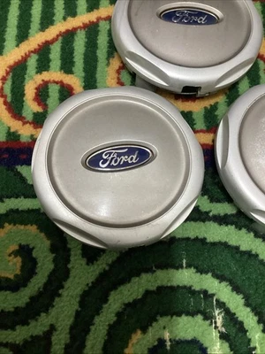 01 05 Ford Explorer Sport Trac Tapa central imperfecciones cosméticas 4L24-1A096BA 1 pieza Foto 1 de 4