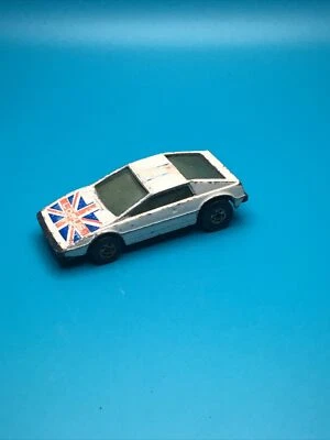 Coche Royal Flash Lotus 1978 Hot Wheels blanco con paredes negras Hong Kong Foto 1 de 4