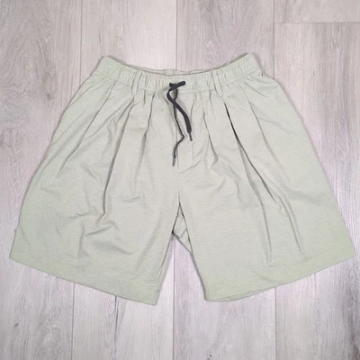 Pantalones Cortos Asics Tejidos Para Hombre Medianos Gris Oliva Verde 8.5" Entrepierna Frontal Plisados Foto 1 de 4