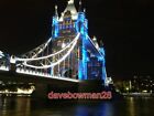 PHOTO  TOWER BRIDGE AND BLUE LIGHTS LONDON  AS SEEN FROM THE RIVERSIDE NEAR SHAD