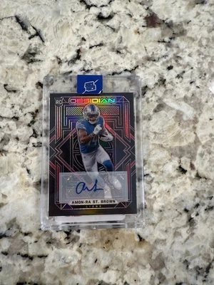 2021 Panini Obsidian - Rookies Amon-Ra St. Brown #134 Autographs /10 SP (AU, RC) - Image 1 of 2