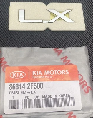 OEM NEW Rear Trunk Emblem Nameplate LX Chrome 2007-2009 Kia Spectra 86314-2F500 - Image 1 of 3