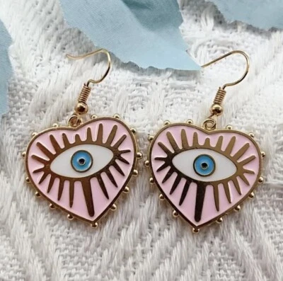 Pendientes colgantes corazón mal de ojo rosa claro Foto 1 de 2