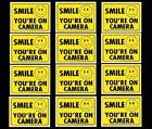 WINDOW SECURITY STICKERS FOR HOME YELLOW SMILE YOURE ON VIDEO CAMERAS ARE IN USE