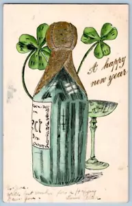 1905 A HAPPY NEW YEAR SAUCER CHAMPAGNE GLASS BOTTLE SHAMROCKS POSTCARD - Picture 1 of 2
