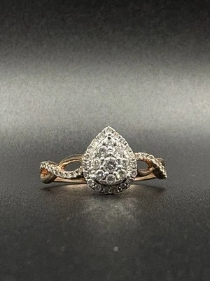 Anillo de promesa de diamantes naturales/zafiro rosa de 1/3 quilate de oro rosa de 10 quilates con pera Jared Foto 1 de 4