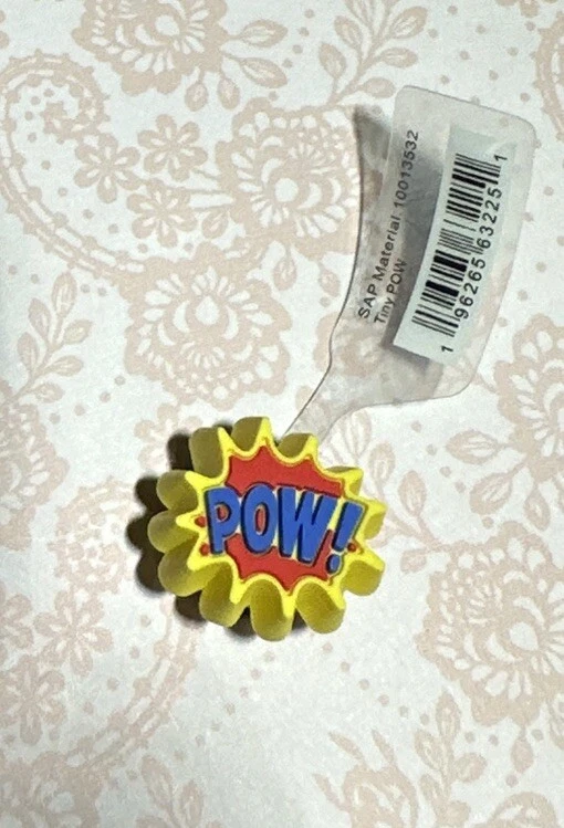 Crocs Jibbitz Charm Tiny POW Foto 1 de 1