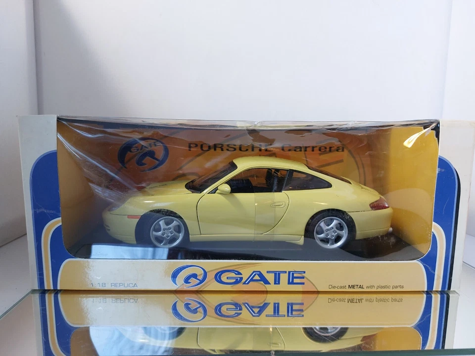 Puerta Porsche 996 cupé amarillo 1:18 en caja casi como nueva Foto 1 de 4