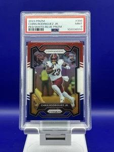 2023 Panini Prizm #398 Chris Rodriguez Jr. ROOKIE ROSSO BIANCO E BLU PRIZM PSA 9 - Foto 1 di 3