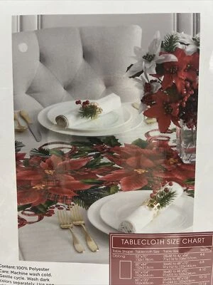 Benson Mills Holiday Poinsettia Plaid Garland Tablecloth 60 x 104” Rectangular - Image 1 of 4