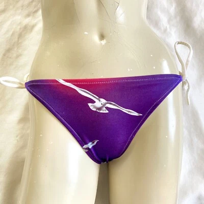 Parte inferior de bikini de playa de pájaro de corte alto vintage de los 80 y 80 cuerda pequeña Foto 1 de 4