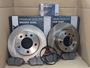 Discos de freno delanteros + pastillas + sensor para BMW Serie 1 E81 E87 116 118 2005-2011 - Imagen 1 de 2