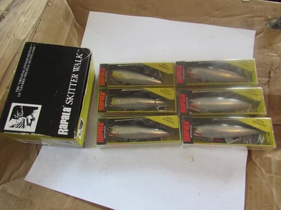 X raro paquete 6 señuelos de pesca de salmonete plateado Rapala Skitter Walk SSW-11 SMU sin usar Foto 1 de 4