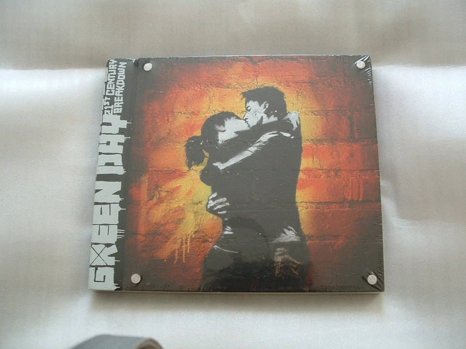 Green Day 21st Century Breakdown Delux  3 X 10"  vinyl With CD and Book,  sealed - Image 1 of 1