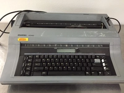 Swintec 4040 Electronic Typewriter - *FOR PARTS/NOT WORKING PROPERLY* POWERS ON. - Image 1 of 4