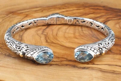 Brazalete de plata de ley 925 y topacio azul con detalles dorados Foto 1 de 4